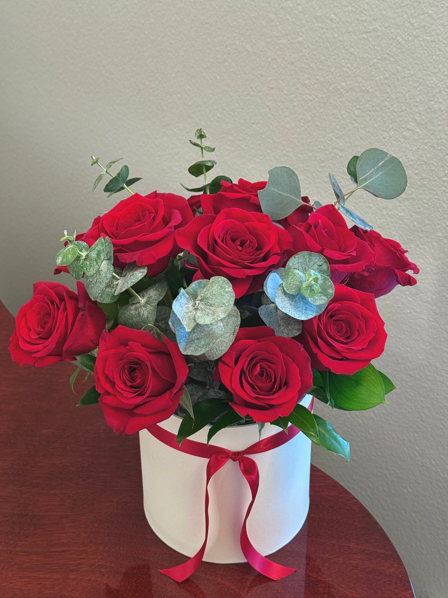 12 Red Roses & Eucalyptus in Box